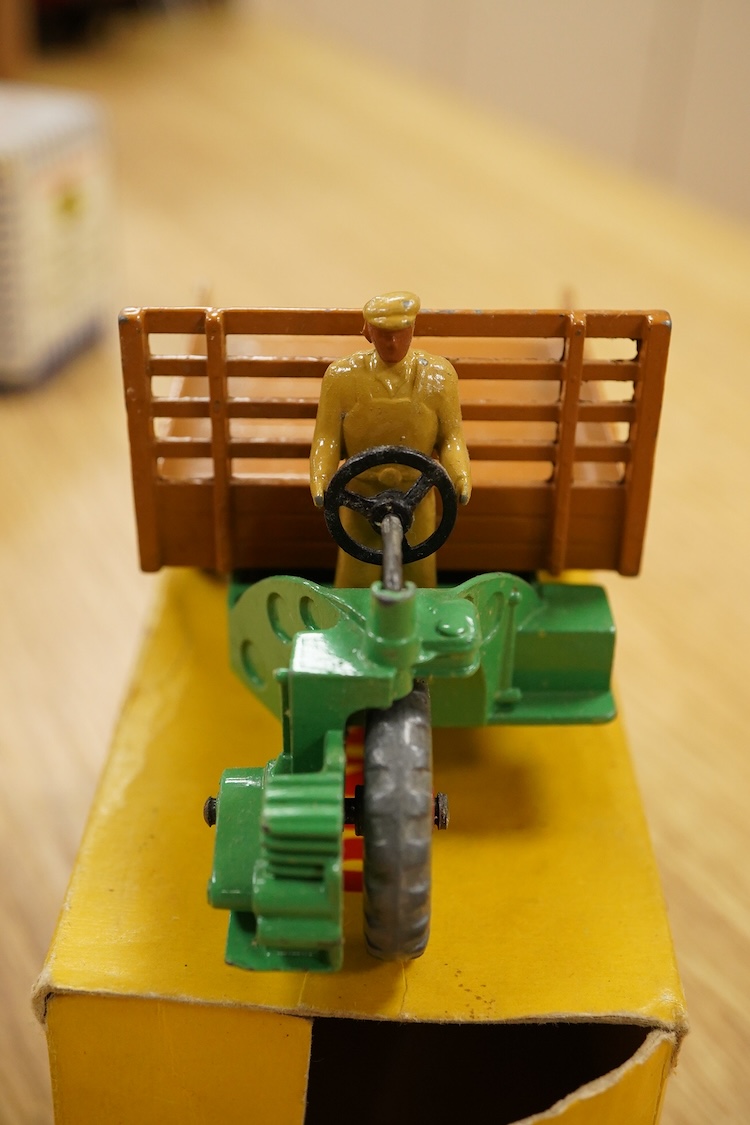 Nine Dinky Toys; Big Bedford Heinz van (923), Austin Atlantic Convertible (106), Austin-Healey 100 (109), M.G. Midget (108), Cunningham C-5R (133), Motocart (342), Austin Champ (674), Army Covered Wagon (623), and Army 1